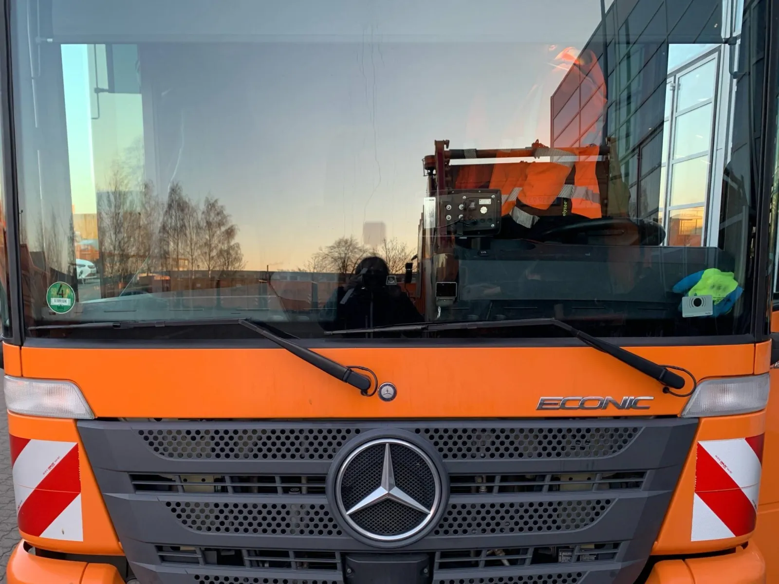 A Stadtreinigung Leipzig waste collection vehicle used as a mobile collection platform